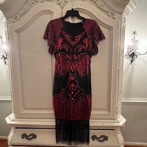 Red and black sequin flapper style dress.